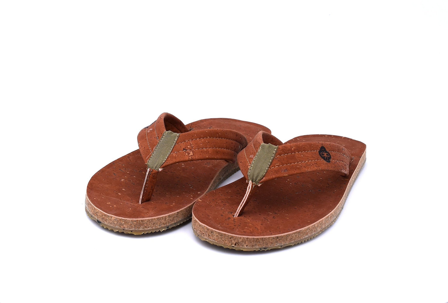 Side view of coffee color cork sandal on white background