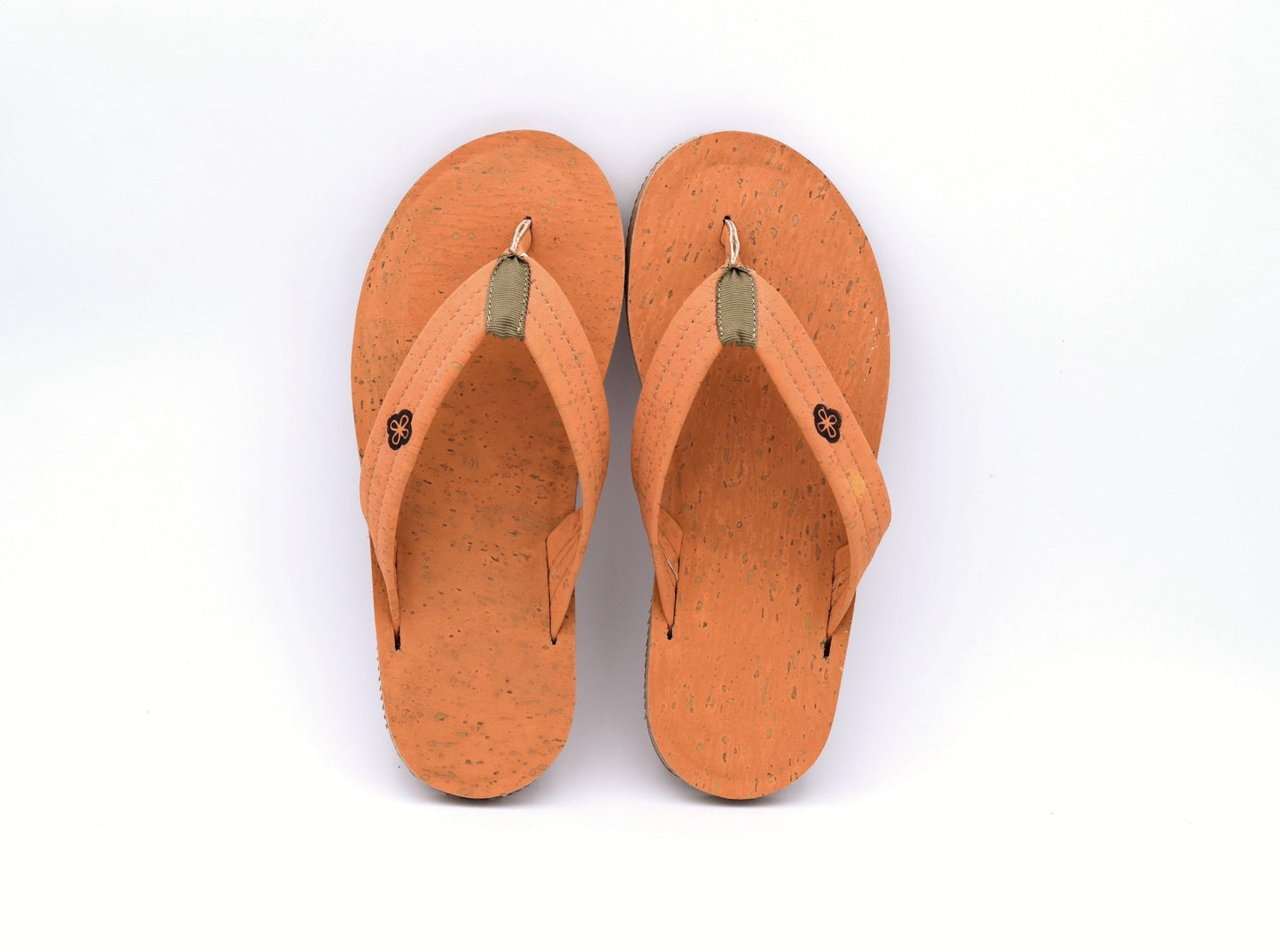 top view white background salmon color cork sandals