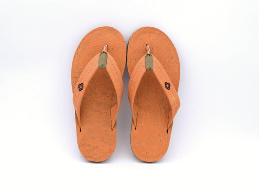 top view white background salmon color cork sandals