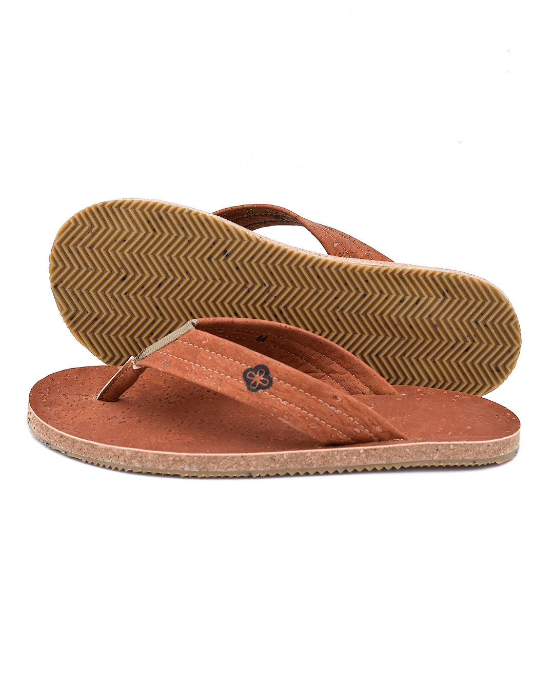 Side view on white background of coffee colour cork sandal showing cork fabric and recycled sole